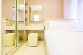 Easy Access to Mall 2BR Green Pramuka City Apartment By Travelio